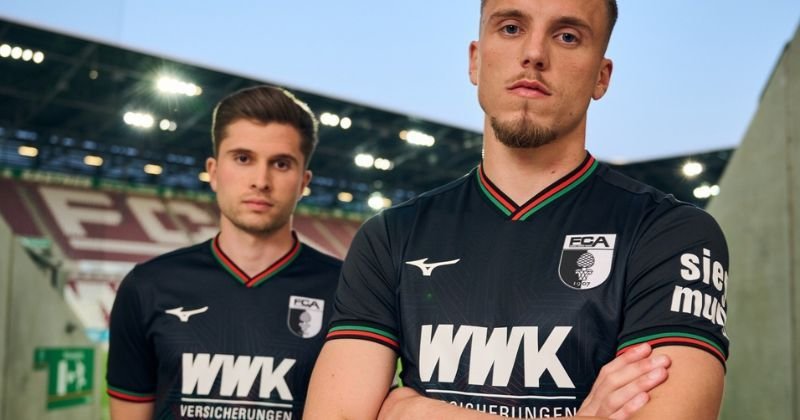 players wearing augsburg 2023-24 third shirt in black